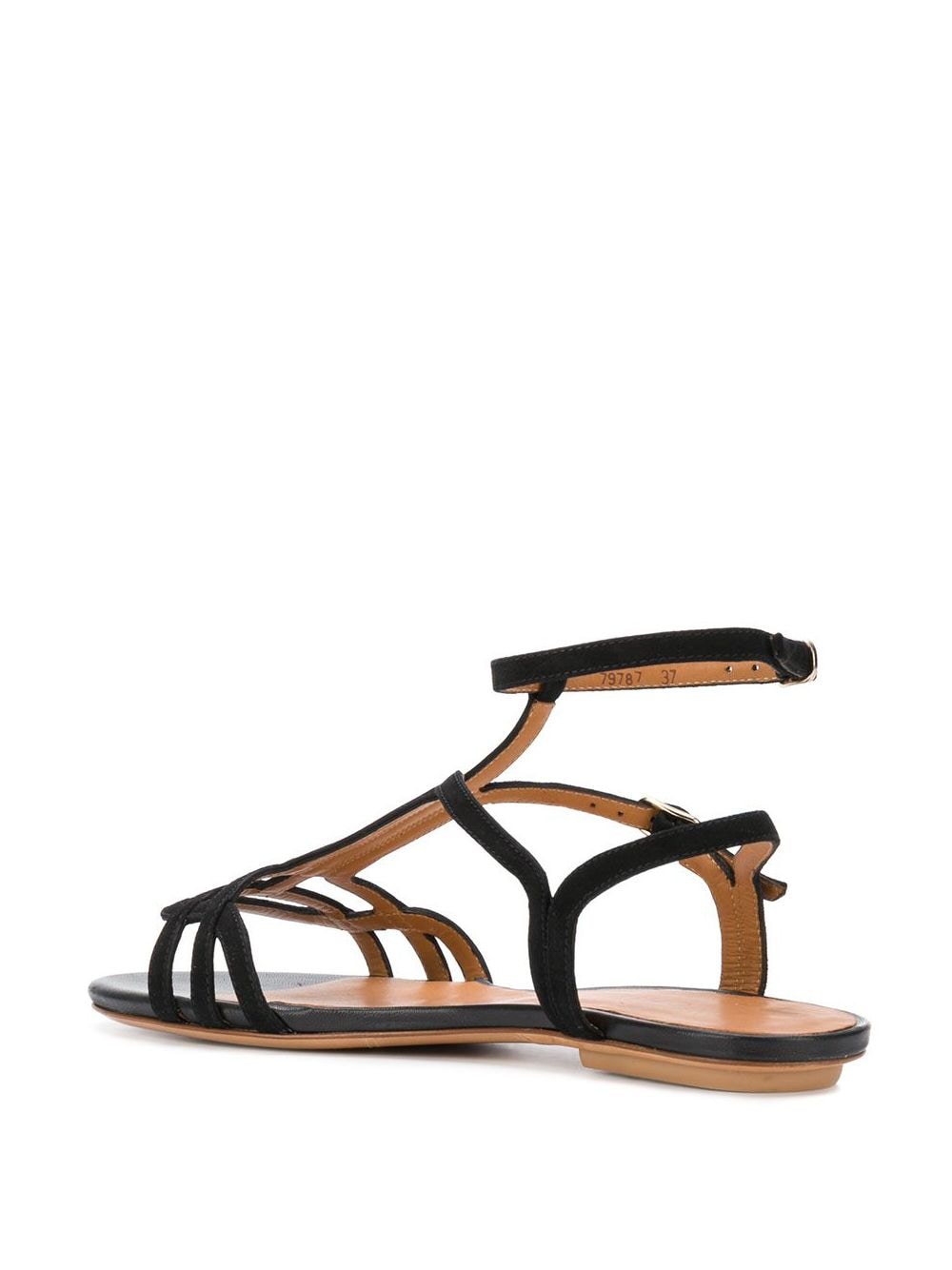 Sandalia plana de mujer en ante negro, modelo YAEL de Chie Mihara, con puntera abierta, doble tira al tobillo y tacón de 1,5 cm. Hecha en España.