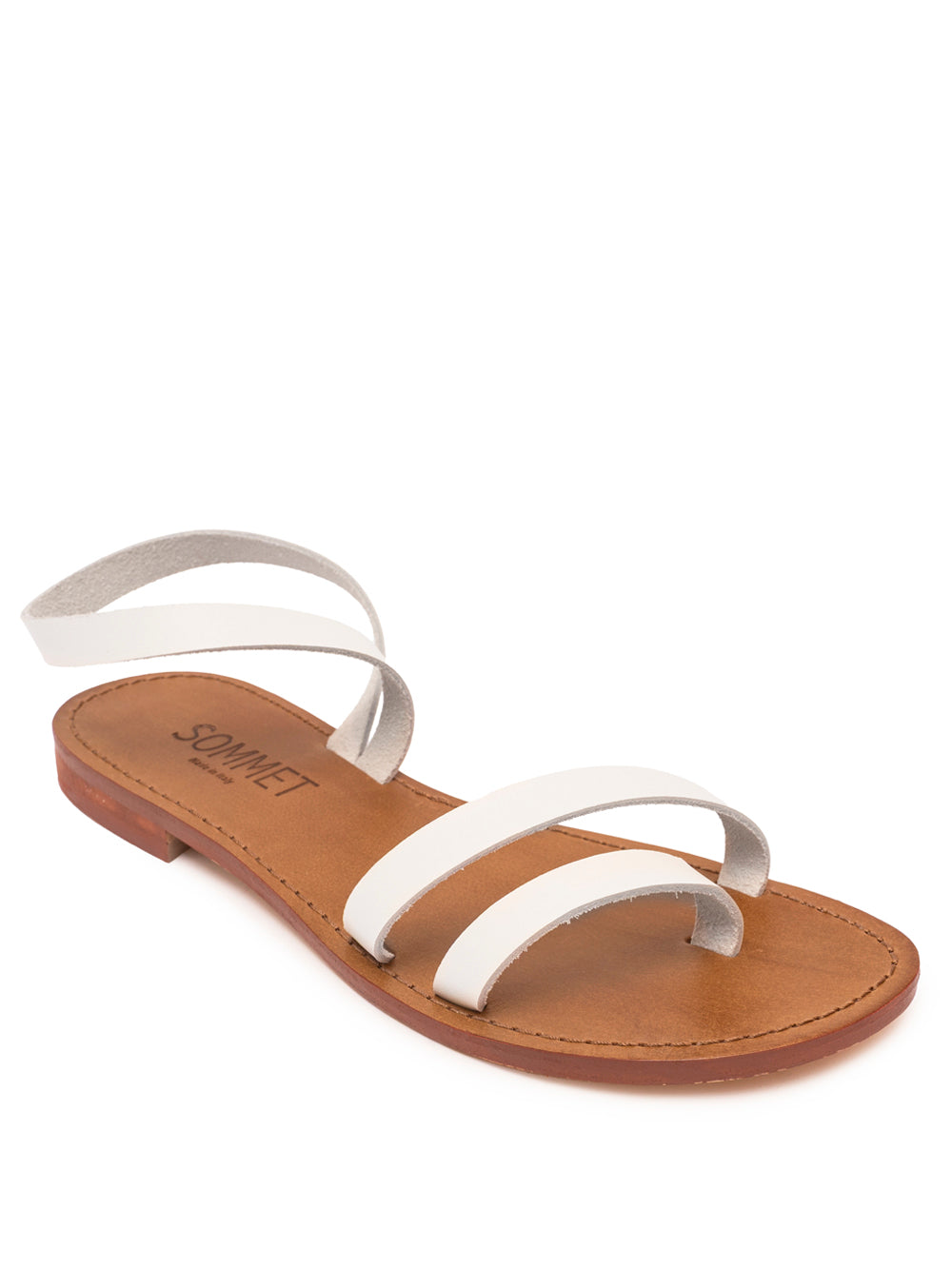 Sandalia Pietrasanta de Cinque Terre en piel blanca, con pulsera al tobillo y suela de cuero. Hecha a mano en Italia.