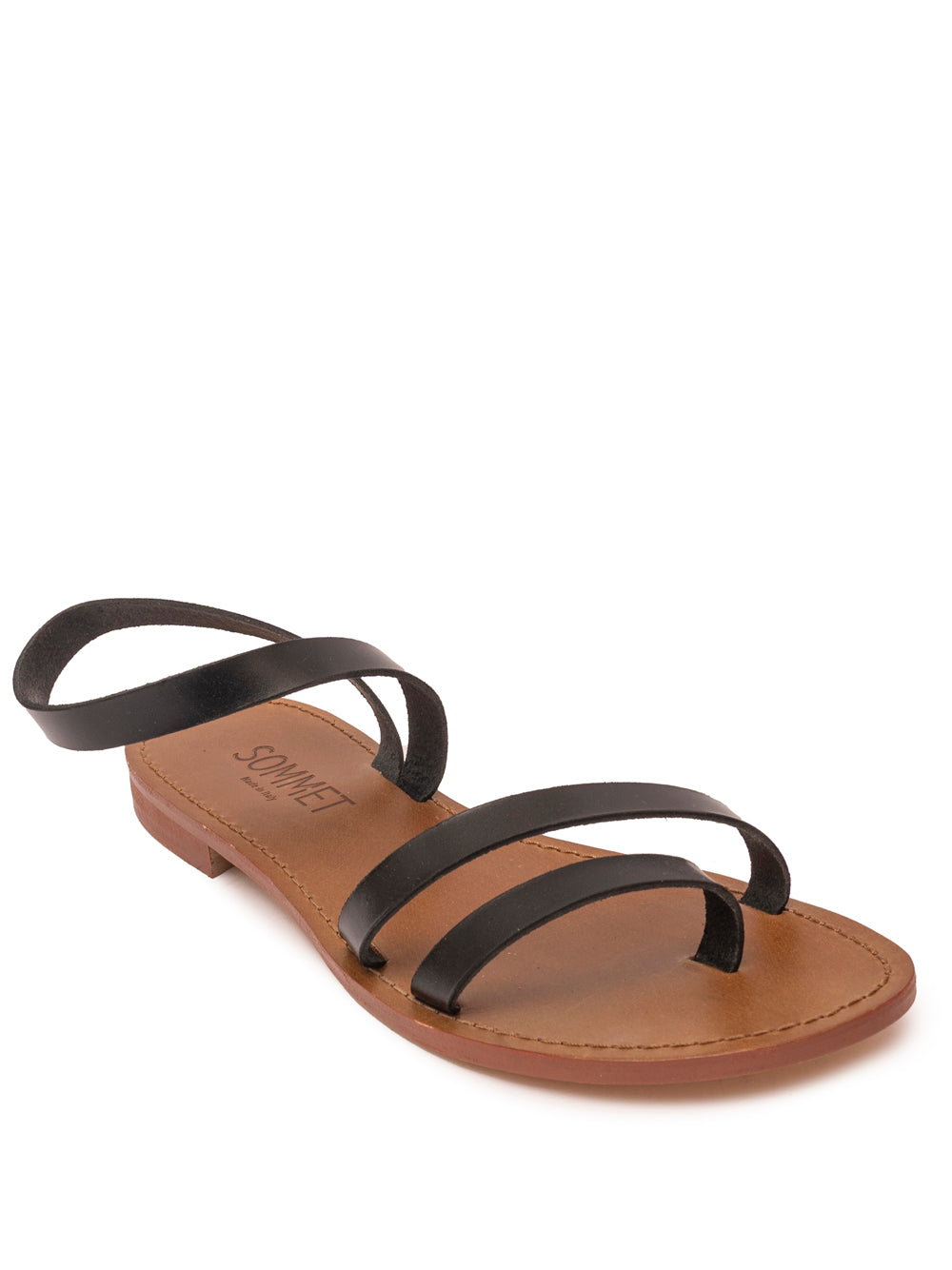 Sandalia Pietrasanta de Cinque Terre en piel negra, con pulsera al tobillo y suela de cuero. Hecha a mano en Italia.