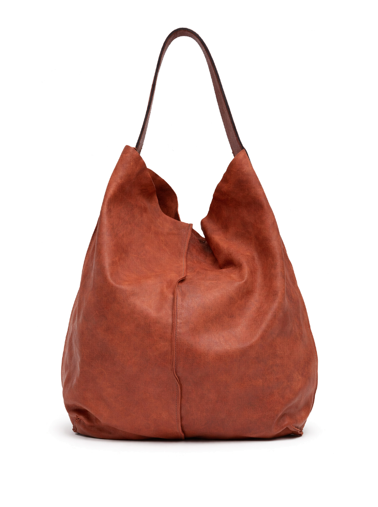 Sommet Sahara siena leather bucket bag in vegetable tanned leather with artisanal waxed finish, handcrafted in Italy.