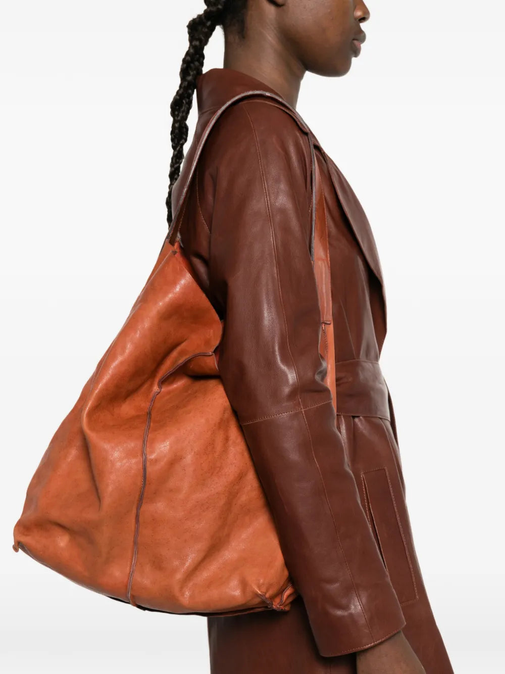 Sommet Sahara siena leather bucket bag in vegetable tanned leather with artisanal waxed finish, handcrafted in Italy.