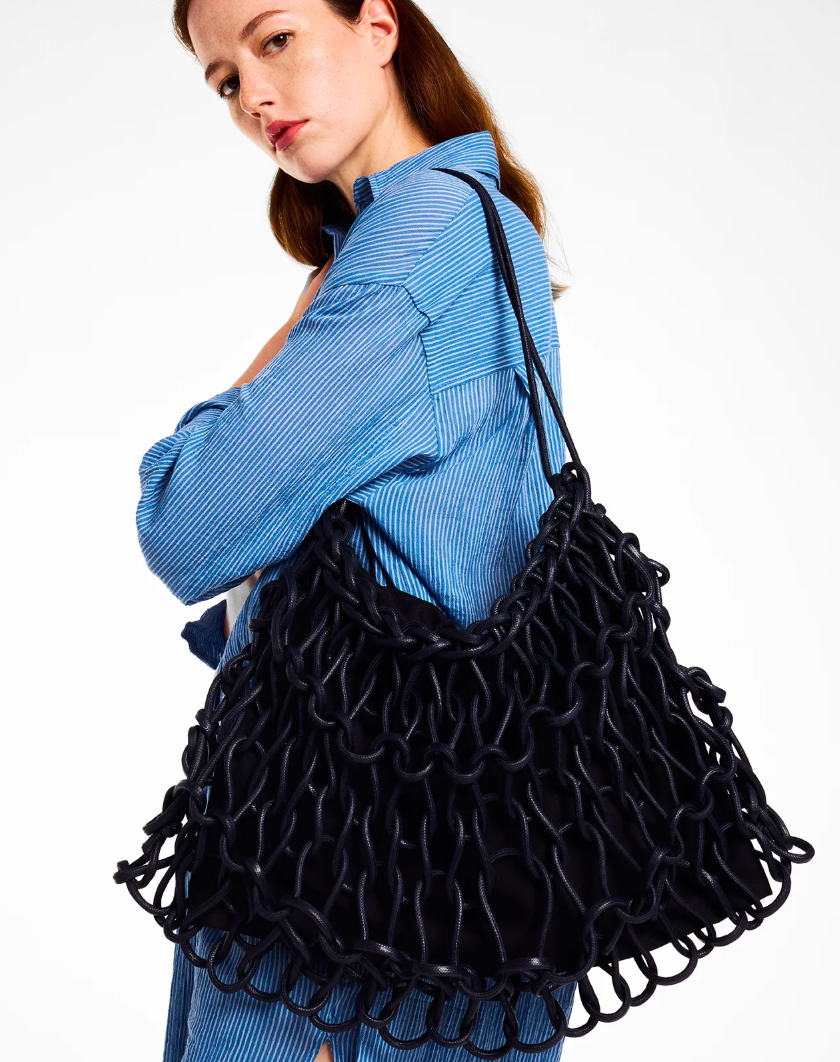 black woven shoulder bag handmade Italy recycled cotton designer bag worn look Alienina Nadia