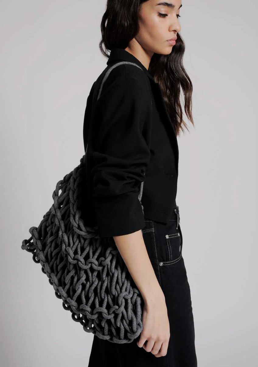 grey woven shoulder bag handmade Italy recycled cashmere designer bag worn look Alienina Nadia