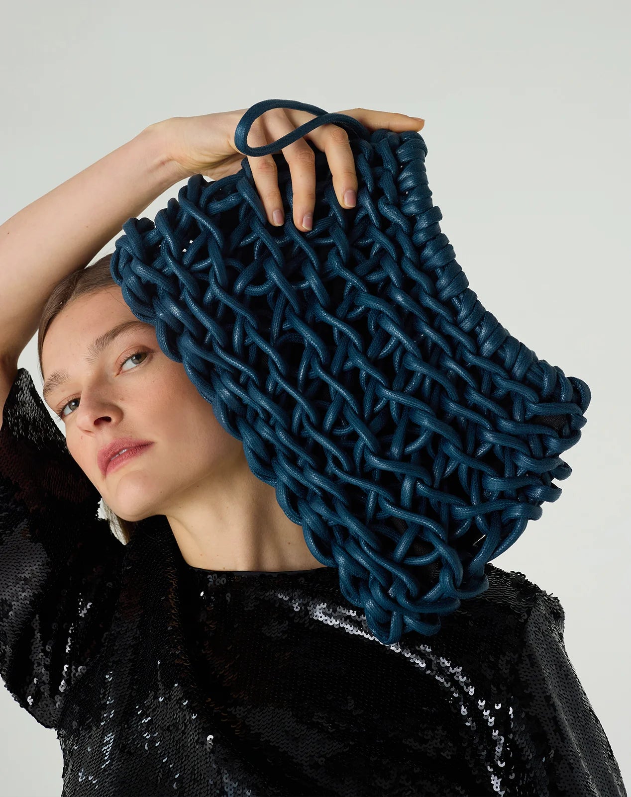 Alienina Nora artisanal woven clutch in navy cotton rope