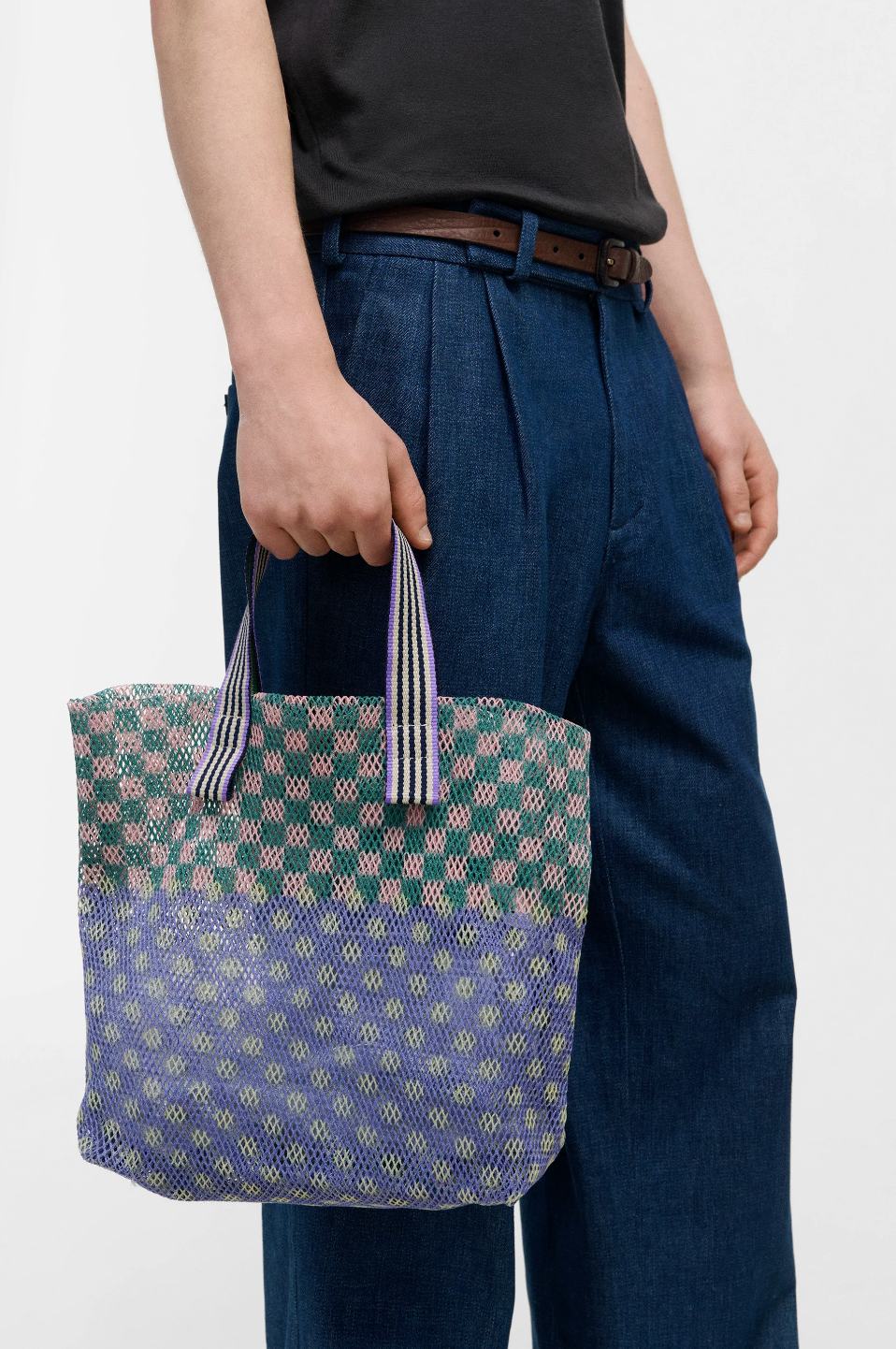 Épice Paris Kanpur Small Tote Bag in Jade — geometric multicolor mesh bag in jade green and lavender tones, held by hand