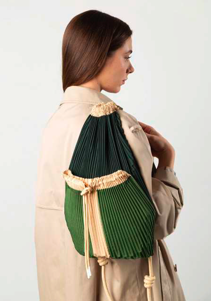 Detail of Multitudes Cini backpack with drawstring closure