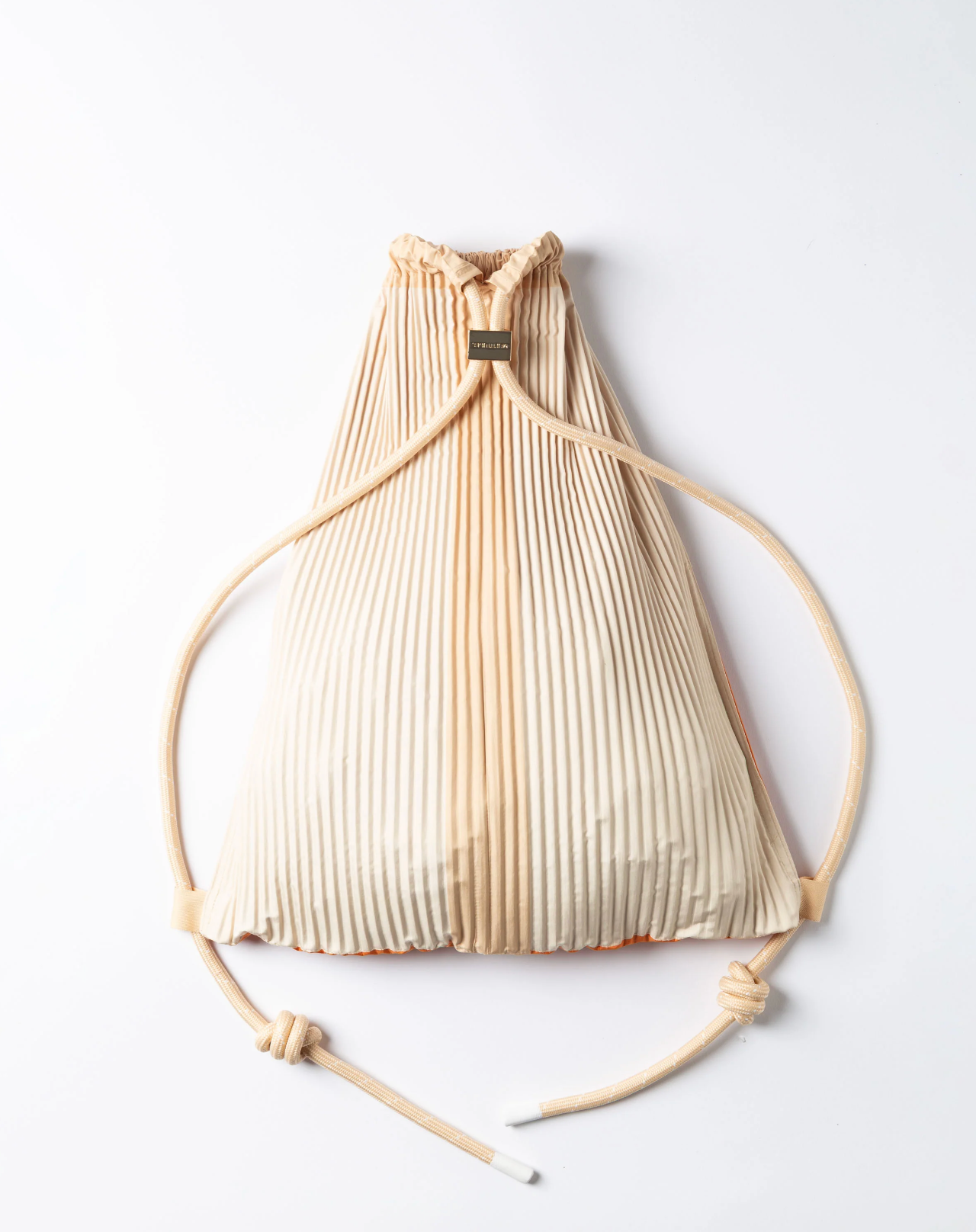 Detail of Multitudes Nanda pleated backpack with drawstring closure