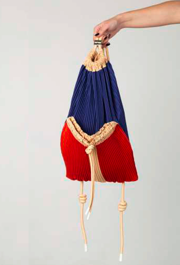 Detail of Multitudes Rossana pleated backpack with color contrast