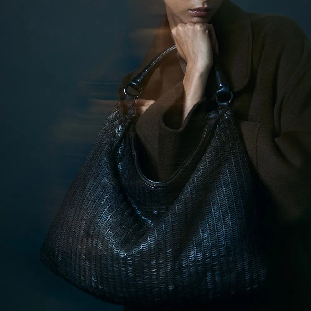 Reptile’s House Lune bag in perforated black calfskin leather, handmade in Italy