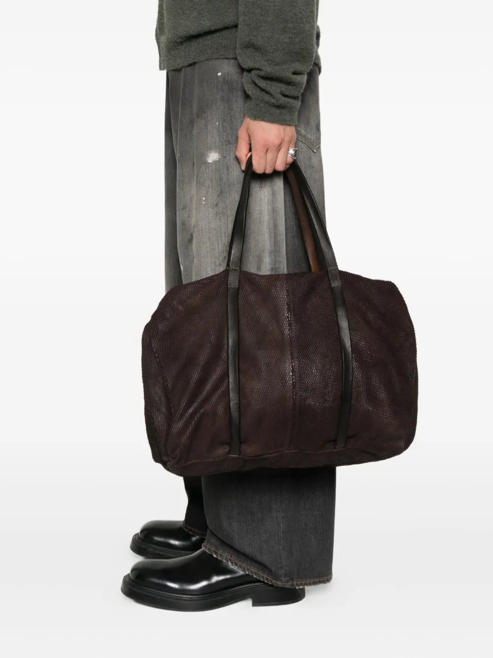 lose-up of Petalino laser texture on Sommet Rian L dark brown vegetable-tanned leather bag