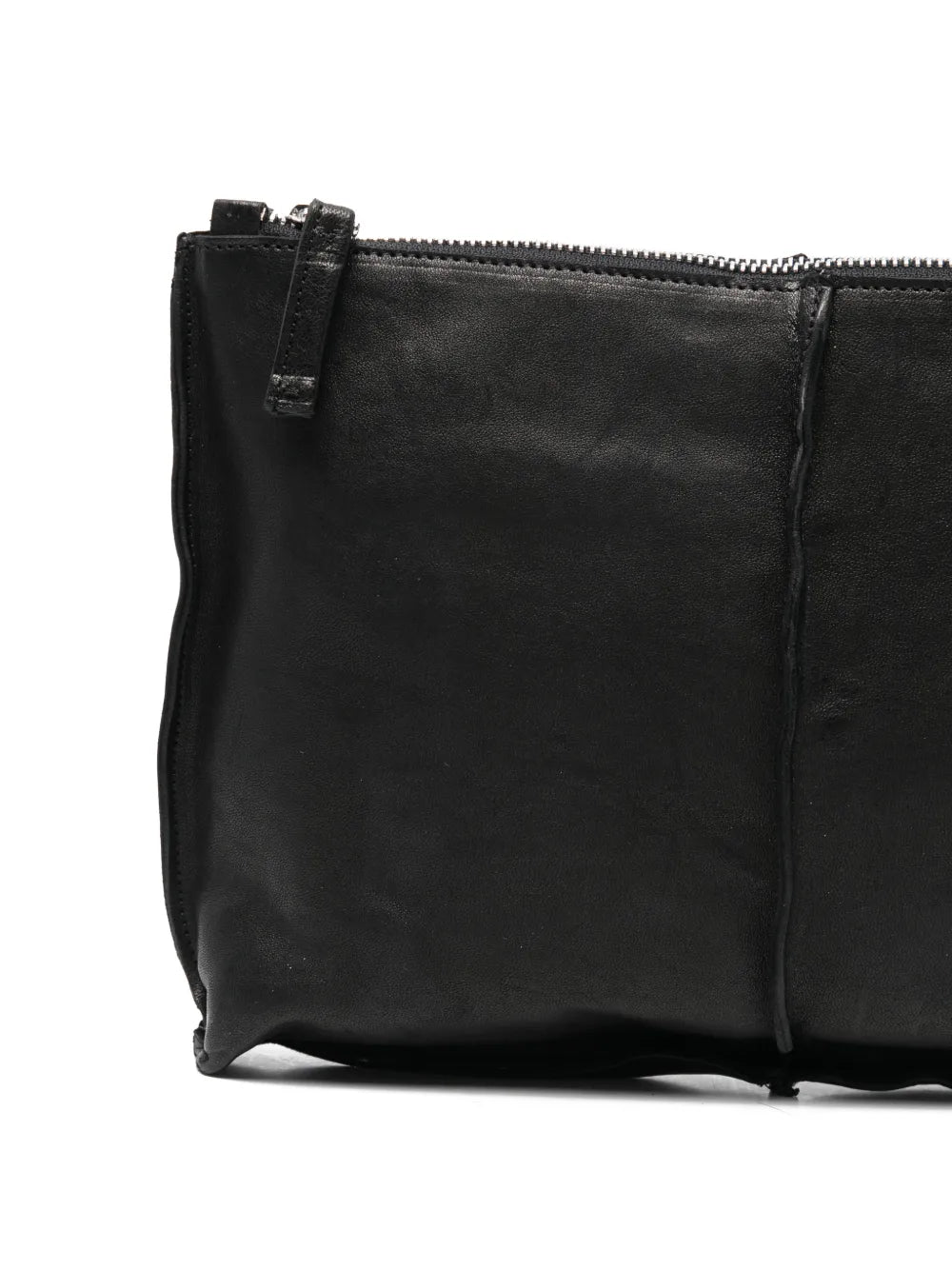 Sommet Clark black vegetable-tanned leather crossbody bag with adjustable strap and artisanal waxed finish, handmade in Italy.