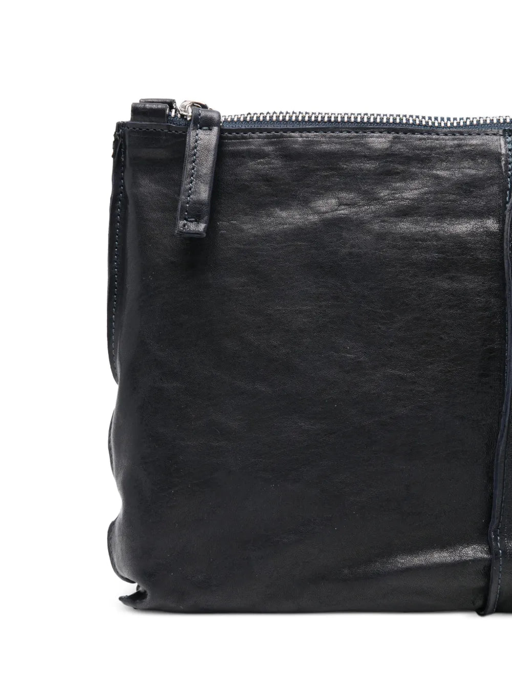 Sommet Clark crossbody bag in deep ocean blue vegetable-tanned leather with adjustable strap and waxed finish, handmade in Italy.