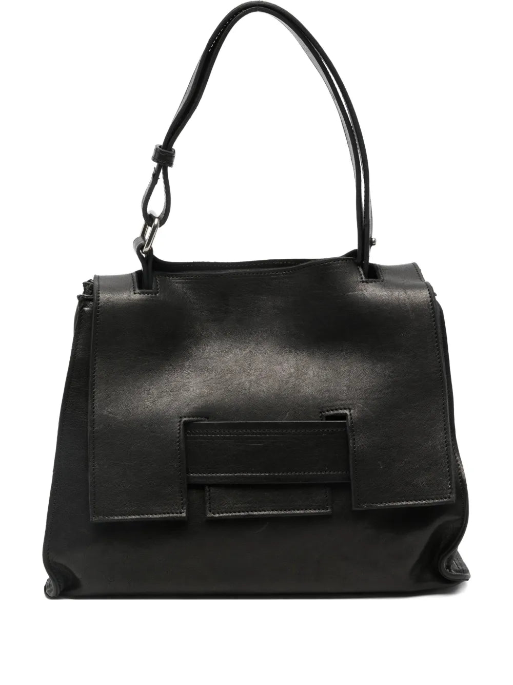 Black structured leather handbag with geometric flap and adjustable strap, handcrafted in Italy.