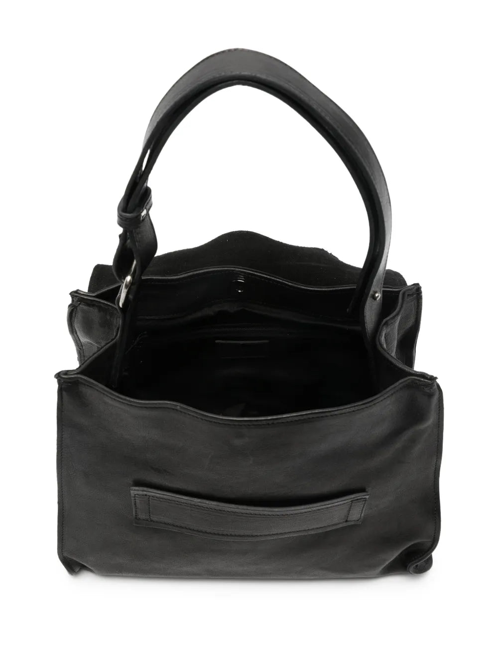 Black structured leather handbag with geometric flap and adjustable strap, handcrafted in Italy.
