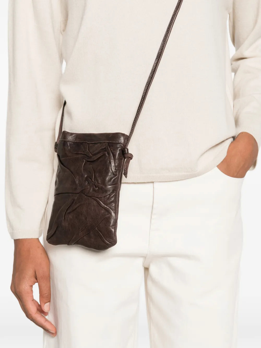 Small handcrafted leather crossbody bag by Sommet in coffee brown, Paloma Plum model with textured folds and adjustable strap, perfect for phone and essentials.