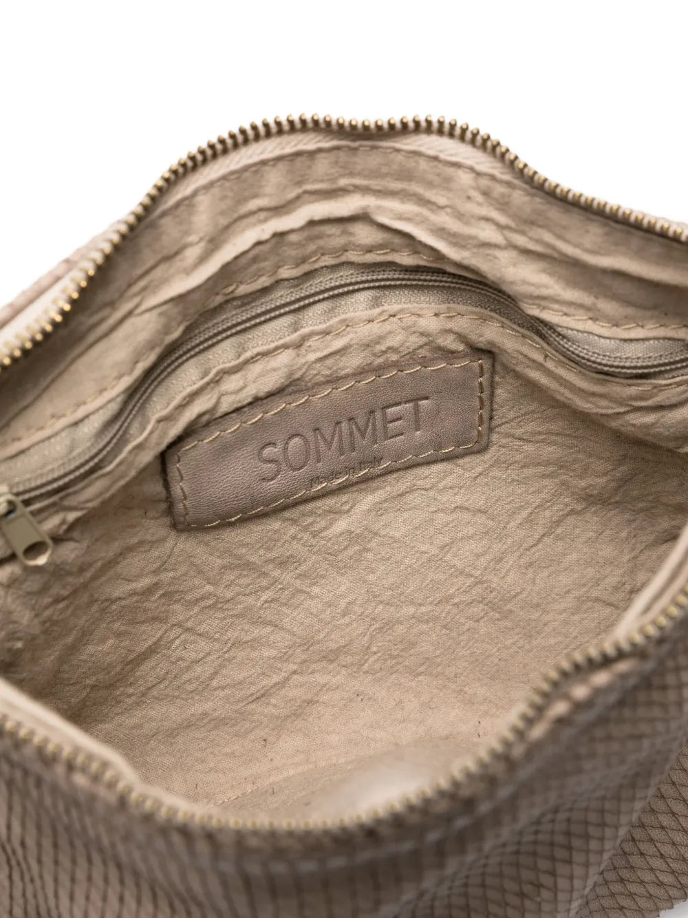 Sommet Petaliño pochette bag in taupe, made from vegetable-tanned calfskin with petal effect, adjustable and removable strap, zipper closure, interior compartments, handcrafted in Italy.