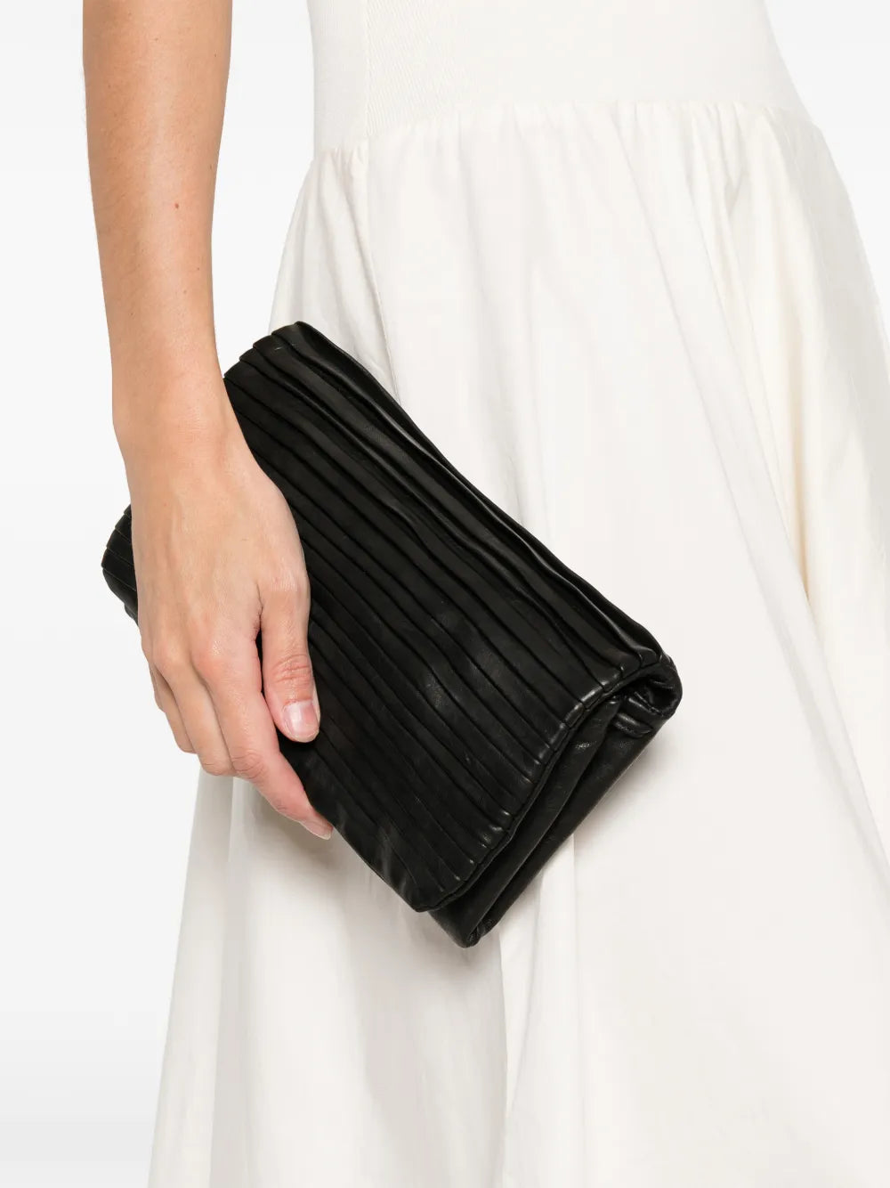 Sommet Soffieta Row black vegetable-tanned pleated leather crossbody bag with adjustable strap, handmade in Italy