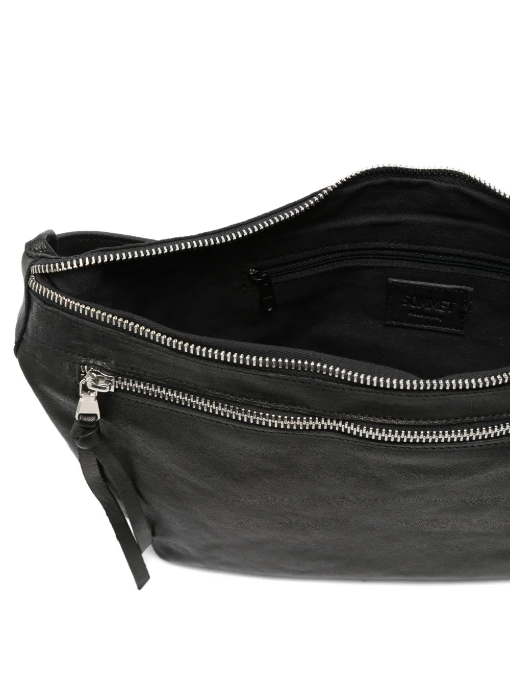 Sommet Enea black leather crossbody bag, vegetable-tanned Italian leather with adjustable strap and interior compartments.