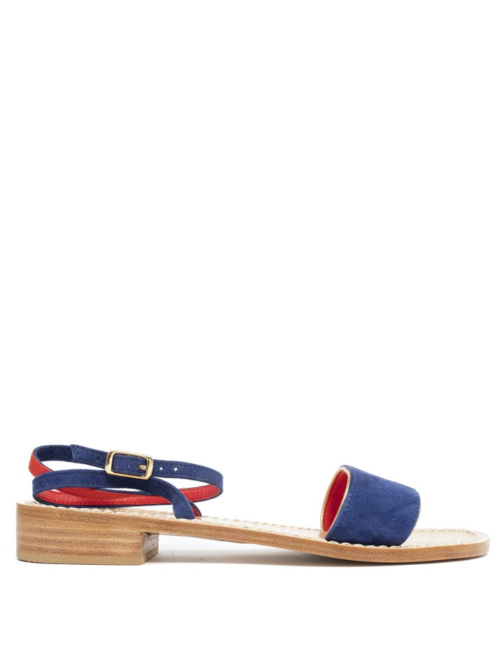 Sandalia Les Paresseuses en ante azul con tiras cruzadas doradas y cierre atado al tobillo. Tacón bajo de 1,5 cm.