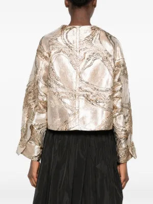 Chaqueta jacquard dorada SUSANNE BOMMER con falda negra