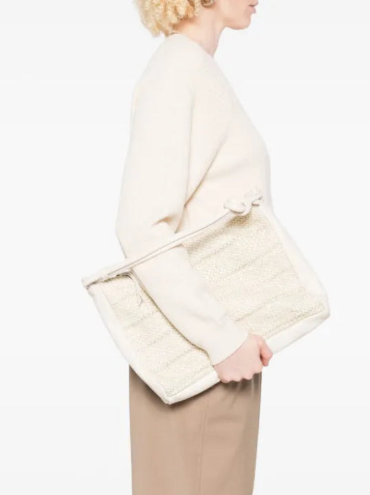 Luxury beige leather bag with perforated details by Reptile’s House