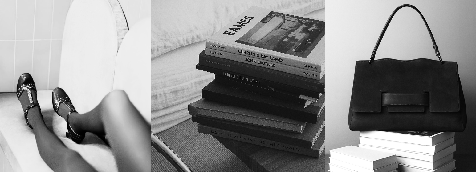 SOMMET campaign image featuring designer shoes and a luxury leather bag, styled in a minimal editorial setting. The photo shows black heels, a suede structured handbag and books, expressing quiet luxury and timeless design.