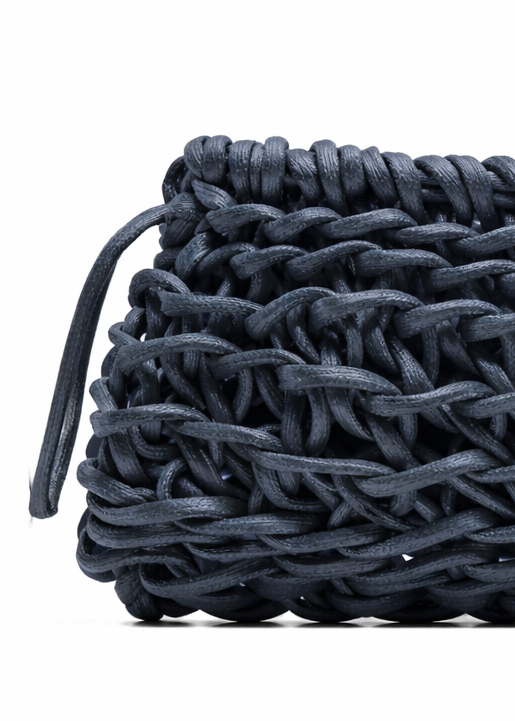 Detail of Alienina Nora handwoven waxed cotton rope clutch in navy