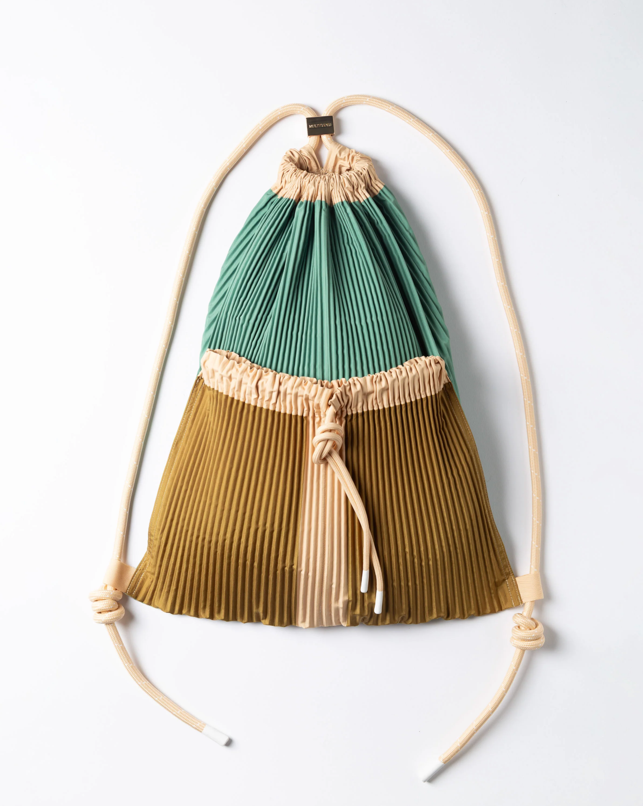 Multitudes Gae pleated backpack in green beige and mustard tones
