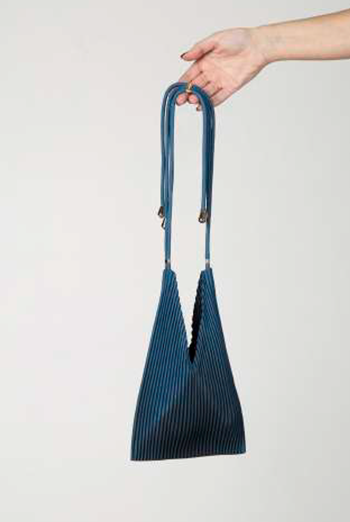 Multitudes pleated baby bag Moroccan blue indigo silk-effect pleated fabric front view
