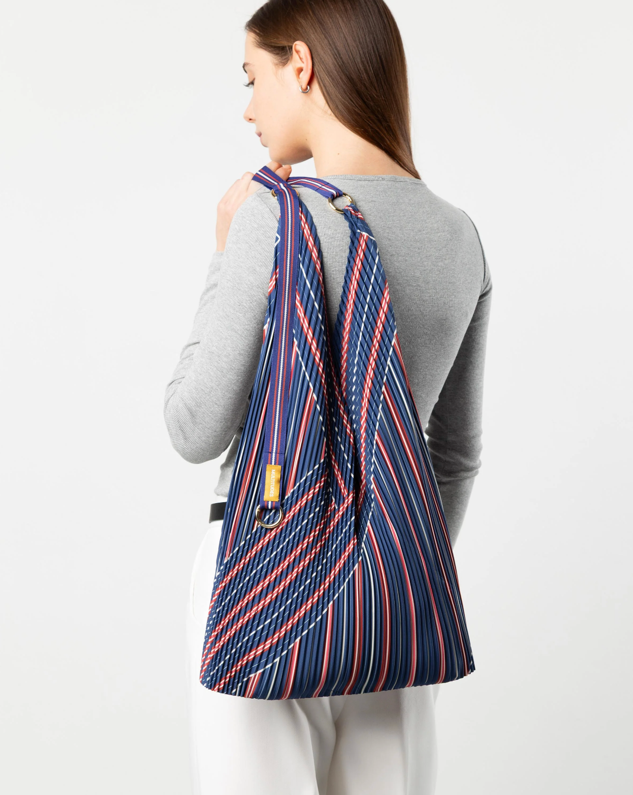 Multitudes Stella Blue bag with matching pouch in recycled satin