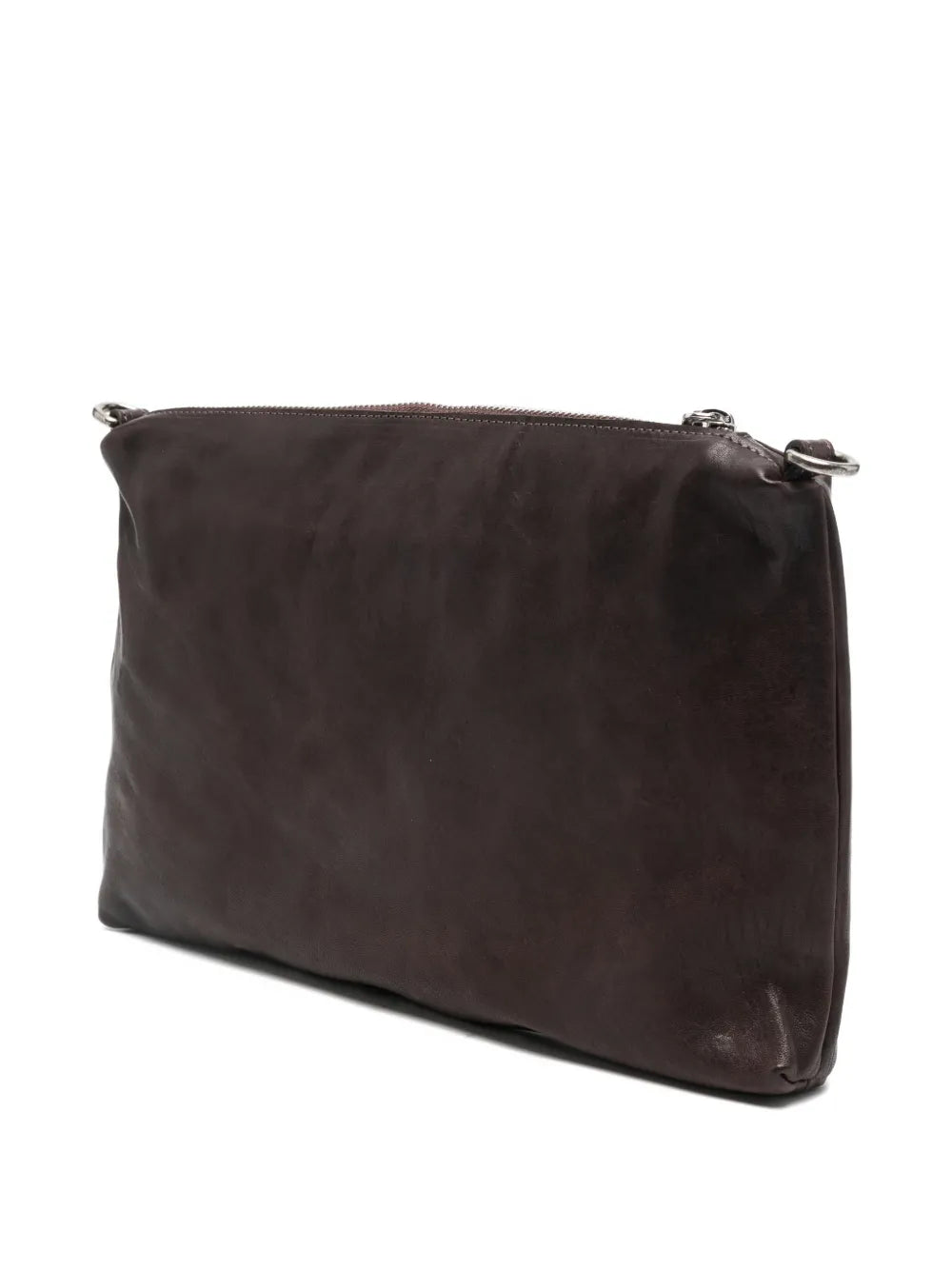 Sommet Alicia crossbody bag in coffee vegetable-tanned leather with bronze laser-cut front panel and adjustable strap, handmade in Italy.