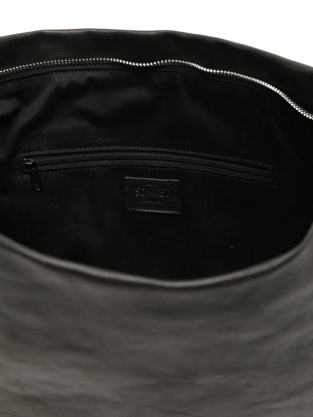 Sommet Lidia black vegetable-tanned leather sack bag with adjustable strap and waxed finish, handmade in Italy