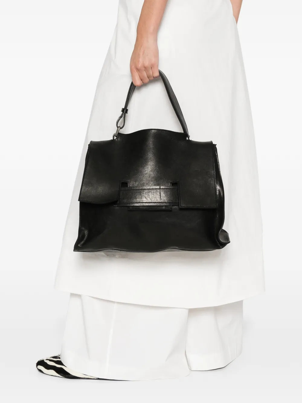 Sommet Mayway L large black handbag made in Italy, handcrafted from vegetable-tanned leather with architectural flap design and adjustable handle