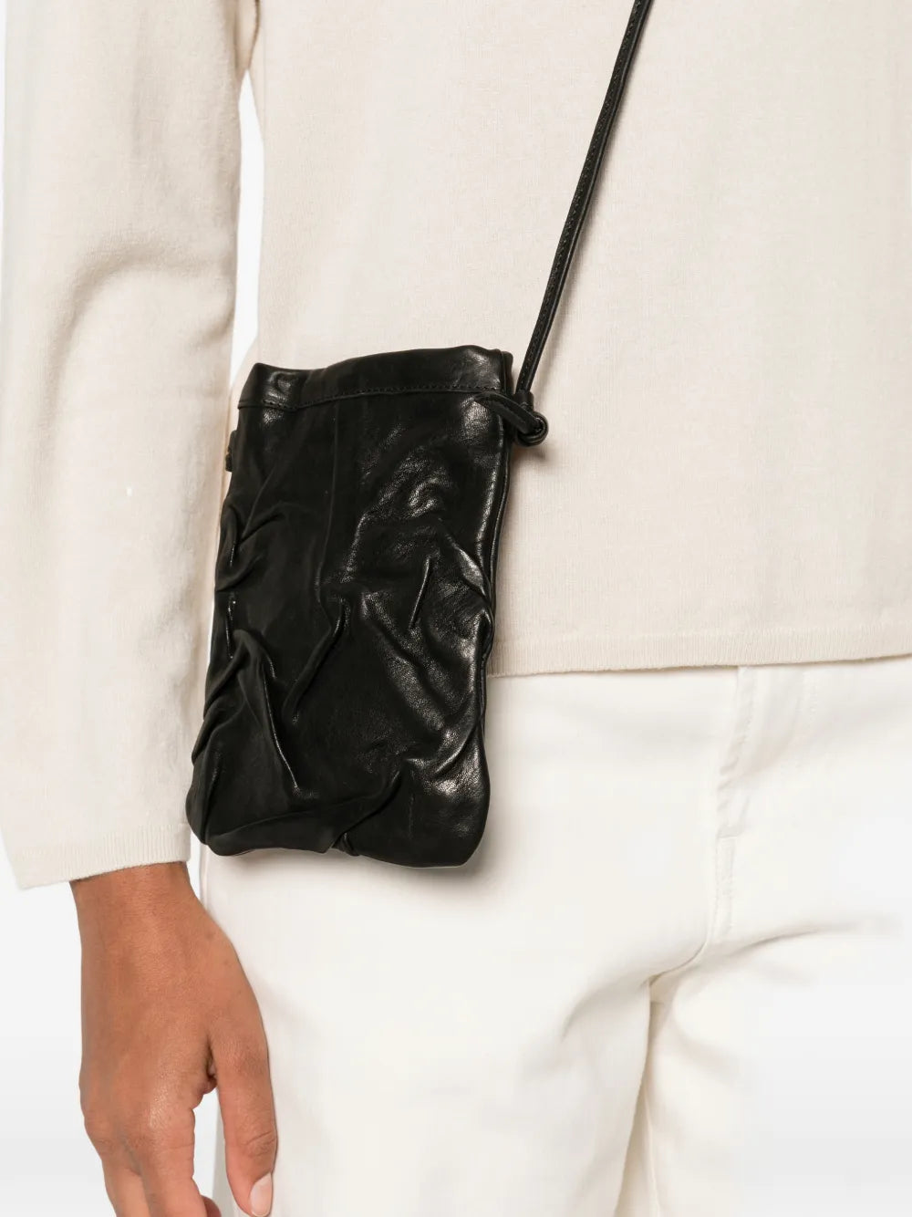 Handcrafted Sommet Paloma Plum black leather crossbody phone bag with adjustable strap and clip closure, made in Italy