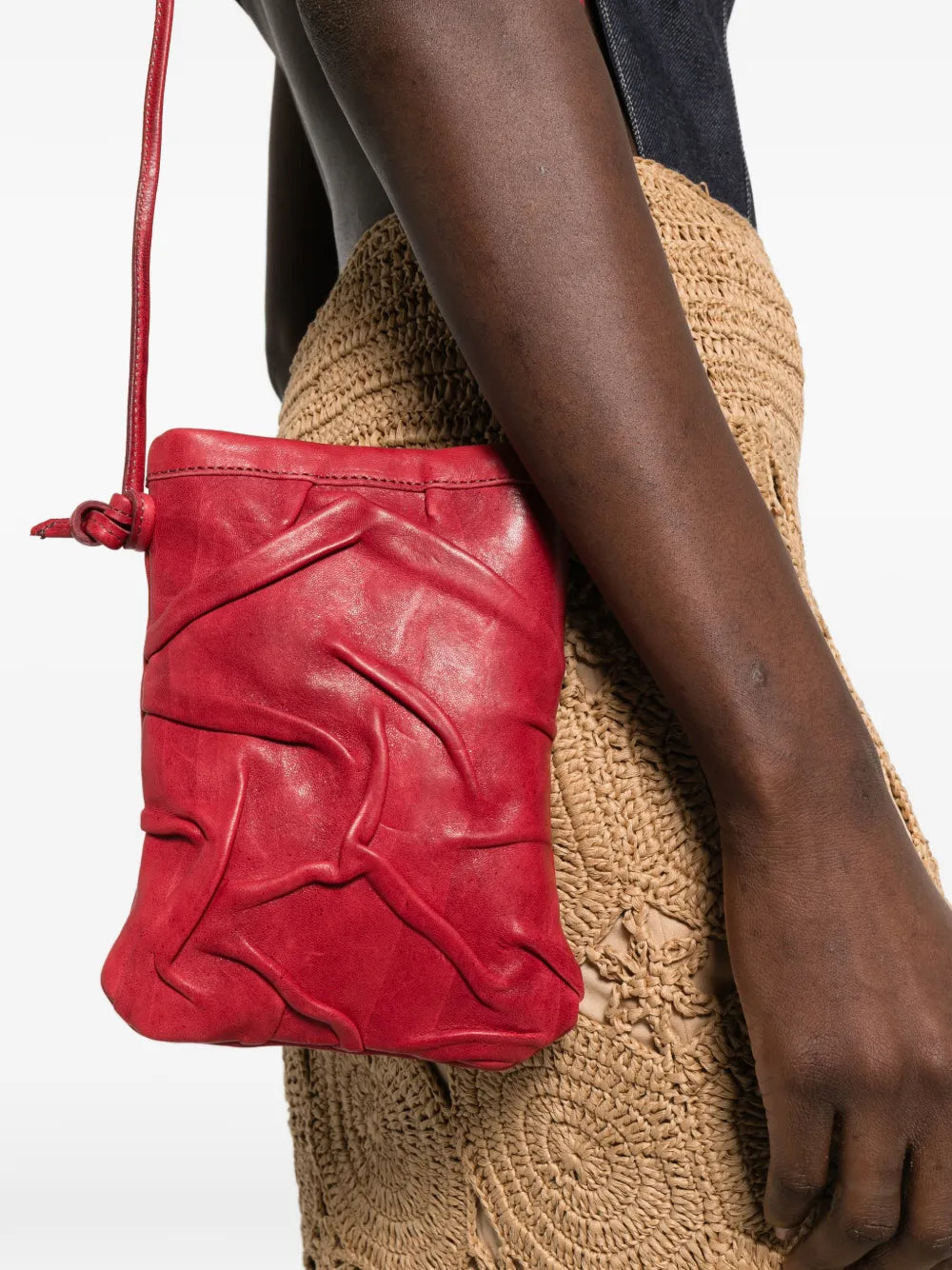 Sommet Paloma Plum bouganville leather crossbody bag with handcrafted origami folded texture, made in Italy.