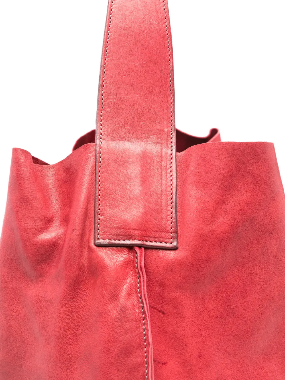 Sommet Sahara bucket bag in bougainville pink vegetable-tanned leather with removable interior pouch and artisanal waxed finish, handmade in Italy.