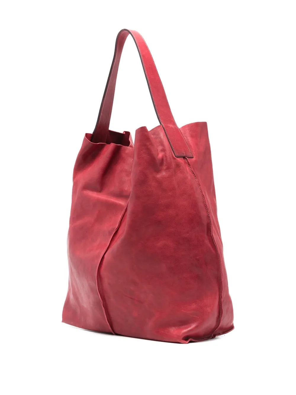 Sommet Sahara bucket bag in bougainville pink vegetable-tanned leather with removable interior pouch and artisanal waxed finish, handmade in Italy.
