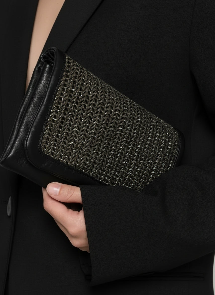 Sommet Soffieta Twitter black vegetable-tanned leather bag with bronze laser-cut front panel and adjustable strap, handmade in Italy